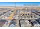 Aerial view of a neighborhood near Sky Ranch Academy and a park at 28334 E 6Th Pl, Watkins, CO 80137