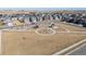 Aerial view of neighborhood park with play equipment and covered picnic area at 28334 E 6Th Pl, Watkins, CO 80137