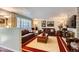 Cozy living room with plush seating, decorative accents, and a warm ambiance at 6436 Otis St, Arvada, CO 80003