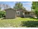 Charming exterior view of a single-Gathering home with a cozy porch and well-maintained lawn at 180 S Lamar St, Lakewood, CO 80226