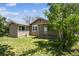 Charming single-story home with a covered front porch and well-maintained lawn at 180 S Lamar St, Lakewood, CO 80226
