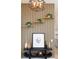 Stylish decor details add character to this home's design including plants and modern art at 8230 W Tennessee Ct, Lakewood, CO 80226