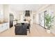Open kitchen boasts a large island, stainless appliances, and lots of cabinet space at 8230 W Tennessee Ct, Lakewood, CO 80226