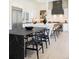 Gourmet kitchen with dual islands, modern appliances, and custom cabinetry for optimal function at 8230 W Tennessee Ct, Lakewood, CO 80226