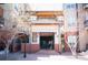 Entrance to Buildings A & B in the community has brick columns and covered entry at 5677 S Park Pl # B310, Englewood, CO 80111