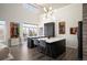 Modern kitchen with tall ceilings, black cabinets, white countertops, and an open concept design at 5677 S Park Pl # B310, Englewood, CO 80111