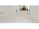 Large bonus room with carpeted floors and entertainment center at 6310 W Sumac Ave, Littleton, CO 80123