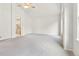 Spacious primary bedroom with vaulted ceilings and ensuite bathroom at 6310 W Sumac Ave, Littleton, CO 80123