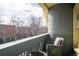 Cozy balcony with seating area and scenic neighborhood views, perfect for relaxing outdoors at 1435 Vine St # 5, Denver, CO 80206