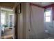 Well-maintained bathroom with a patterned shower curtain and updated fixtures at 1435 Vine St # 5, Denver, CO 80206