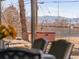 View of a backyard featuring a hot tub from a seating area with mountain views in the distance at 8331 Oakwood St, Westminster, CO 80031