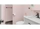 Stylish bathroom with modern vanity, sleek fixtures, and light pink walls at 8331 Oakwood St, Westminster, CO 80031