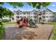 Bright and fun community playground with slides and play equipment, perfect for playtime at 15700 E Jamison Dr # 3-307, Englewood, CO 80112