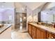 Spa-like bathroom featuring a walk-in shower and soaking tub at 1650 Locust St, Denver, CO 80220
