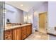 Elegant bathroom with dual sinks, granite countertops, and custom cabinetry at 1650 Locust St, Denver, CO 80220