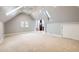 Large bonus room with high ceilings and skylights at 1650 Locust St, Denver, CO 80220