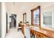 Bright office space featuring wood desks, built-ins and natural light from the windows at 1650 Locust St, Denver, CO 80220