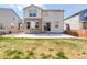 Fenced backyard featuring a patio, lawn area, and appealing design for a relaxing outdoor experience at 434 N Old Hammer St, Aurora, CO 80018