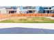 Fenced backyard with patio and lawn offers privacy and space for outdoor enjoyment at 434 N Old Hammer St, Aurora, CO 80018