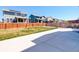 Backyard featuring a concrete patio, grass area and fence, perfect for relaxation and entertainment at 434 N Old Hammer St, Aurora, CO 80018