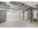 Large unfinished basement with exposed mechanicals, concrete walls, and an open design ready for transformation at 434 N Old Hammer St, Aurora, CO 80018