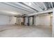 Spacious unfinished basement featuring an open layout, exposed pipes, and ample potential for future development at 434 N Old Hammer St, Aurora, CO 80018