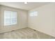 Bright bedroom with carpeted floors and windows for natural light at 434 N Old Hammer St, Aurora, CO 80018