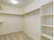 Spacious walk-in closet with ample shelving and storage space at 434 N Old Hammer St, Aurora, CO 80018