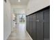 Bright hallway with decorative wall accents and durable flooring at 434 N Old Hammer St, Aurora, CO 80018
