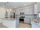 Contemporary kitchen with stainless steel appliances and granite counters at 434 N Old Hammer St, Aurora, CO 80018