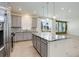 Well-lit kitchen featuring granite countertops and ample cabinet space at 434 N Old Hammer St, Aurora, CO 80018