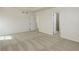 Carpeted bedroom showcasing a connected bathroom, offering privacy and comfort at 434 N Old Hammer St, Aurora, CO 80018