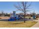 Fun and colorful playground in a well-maintained community park, perfect for children and families to enjoy outdoor activities at 434 N Old Hammer St, Aurora, CO 80018