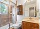 Updated bathroom with tiled shower and vanity at 101 S Downing St # 8, Denver, CO 80209