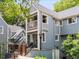 Charming townhouse with a private balcony, classic lamppost and landscaped entrance at 101 S Downing St # 8, Denver, CO 80209