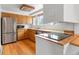 Cozy kitchen with stainless steel appliances and hardwood floors at 101 S Downing St # 8, Denver, CO 80209