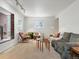 Bright living room with fireplace and ample space for seating at 101 S Downing St # 8, Denver, CO 80209