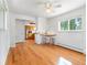 Bright, open room featuring hardwood floors, bar seating, and access to a stainless steel kitchen at 101 S Downing St # 8, Denver, CO 80209