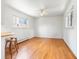 Spacious living room with hardwood floors, complemented by two wooden stools at an attached bar at 101 S Downing St # 8, Denver, CO 80209