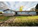 Expansive backyard featuring a large wooden deck perfect for outdoor gatherings and relaxation at 8895 Morton Rd, Niwot, CO 80503