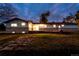 A split level home with an expansive back yard is seen at dusk at 8895 Morton Rd, Niwot, CO 80503