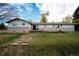 Expansive backyard featuring a large wooden deck perfect for outdoor gatherings and relaxation at 8895 Morton Rd, Niwot, CO 80503