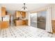 Charming eat-in kitchen features a sliding glass door to the outdoors and retro design at 8895 Morton Rd, Niwot, CO 80503