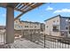 Balcony overlooking townhouses with a view of neighboring buildings and some snow at 7870 W 43Rd Pl, Wheat Ridge, CO 80033