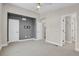 Bedroom featuring doorways and an accent wall at 7870 W 43Rd Pl, Wheat Ridge, CO 80033