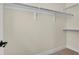 Walk-in closet featuring shelves and hanging bars at 7870 W 43Rd Pl, Wheat Ridge, CO 80033