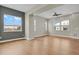 Spacious living room with hardwood floors, bright windows, and a neutral color palette at 7870 W 43Rd Pl, Wheat Ridge, CO 80033