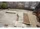 Aerial view of a spacious wooden deck and tiered backyard, presenting ample outdoor living and entertaining space at 18438 E Berry Dr, Centennial, CO 80015