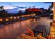 Cozy deck space, outdoor seating and dining sets, plus pretty sunset skies at 4899 N Mesa Dr, Castle Rock, CO 80108