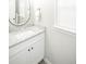 Bathroom boasts granite countertop and modern sink at 1716 Moline St, Aurora, CO 80010